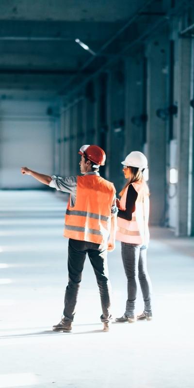 Image of warehouse workers in hard hats